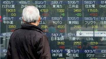 Asia stocks follow Wall St down after US recession warning