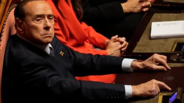 Berlusconi's treatment for infection continues in hospital