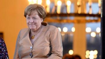 Ex-leader Merkel decorated with highest German honor