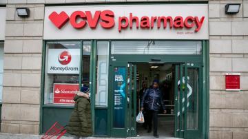 CVS beats Q1 expectations, cuts forecast after buying spree