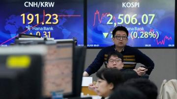 Stock market today: Global shares decline ahead of reports