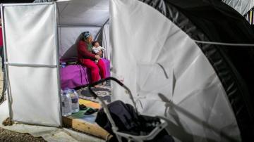 AP PHOTOS: In quake-devastated Turkey, voting in presidential election is no simple task
