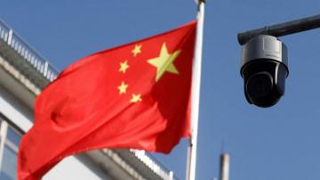 China sentences American citizen to life on spying charge