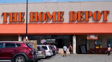Home Depot, after years of explosive growth, cuts its outlook as Americans cool spending on homes