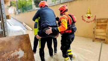 Rain-swollen rivers flood some towns in north Italy; Venice prepares to raise mobile dike in lagoon