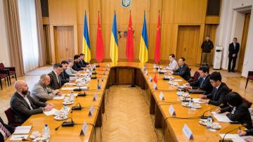 Ukraine's foreign minister and visiting Chinese envoy discuss peace, but next steps unclear