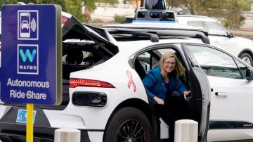 Waymo, Uber set aside past rift over self-driving car technology to team up on robotaxis in Phoenix