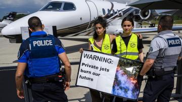 Geneva airport briefly closed as climate activists protest private jet fair