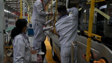 China factory activity slows, adding to economic strains