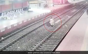 Railway Cop Rescues Man From Being Run Over By A Train In West Bengal