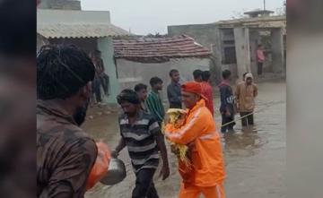 Watch: Cyclone Rescue Team Carries Infant In Empty Cement Bag In Gujarat