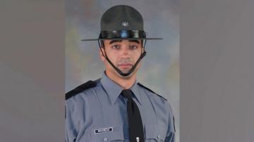 Hundreds of rounds fired in gunfight with suspect who killed trooper, wounded another