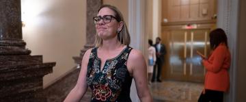 Sinema cites bill targeting leaders of failed banks after criticism of her Wall Street ties