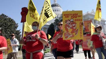 California's law aimed at fast food wages is on hold. Lawmakers may have found a way around it