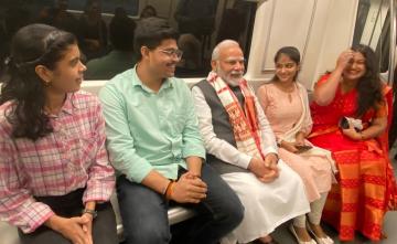 Watch: PM Modi Boards Metro To Visit Delhi University