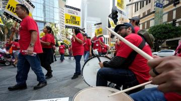 Workers strike at major Southern California hotels over pay and benefits