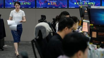 Stock market today: Asian shares mostly lower after China reports weaker than expected growth in 2Q
