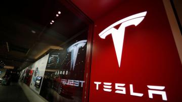 Tesla directors to return more than $735 million to company to settle suit challenging compensation