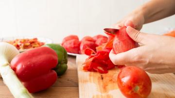 Peel Tomatoes Faster by Torching Them on a Gas Stove