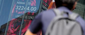 Stock market today: Asian shares are mixed as markets brace for the US inflation report