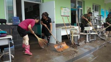 China's Xi calls for measures to mitigate disastrous flooding amid economic slowdown