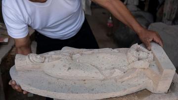 Traditional stone carvers chisel on despite loss of quarries in village swallowed by Mexico City