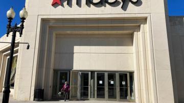 Macy's swings to loss and posts sales decline in 2Q but adjusted results beat Wall Street views