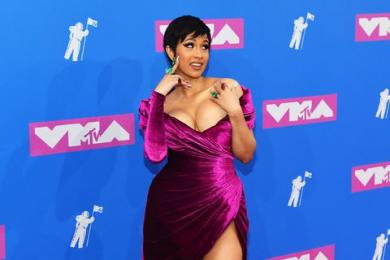 Cardi B Returns to the Red Carpet Swathed in Purple Velvet and 4 Million Dollars Worth of Jewels