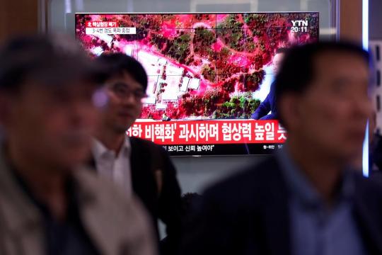 North Korea blows up nuclear test site amid doubts over summit