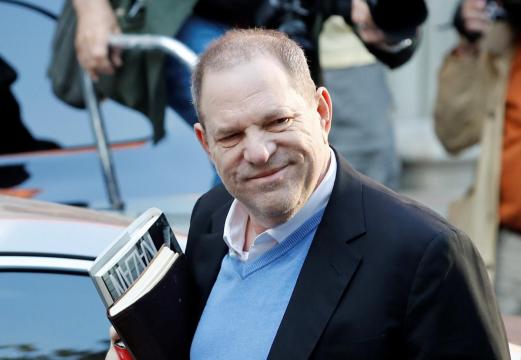 Movie producer Weinstein surrenders on sex assault charges