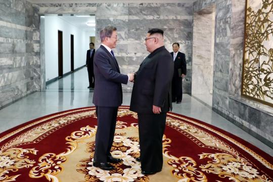 Leaders of two Koreas hold surprise meeting as Trump revives hopes of summit with North