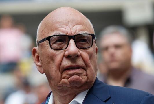 Britain clears way for Murdoch to battle Comcast for Sky