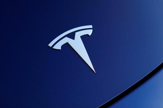 Tesla shares rise as Musk says Model 3 set to hit target