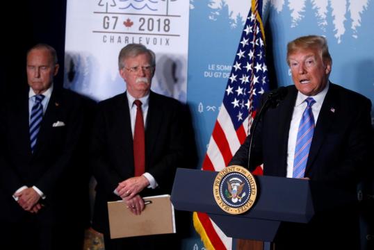 Trump threatens U.S. allies on trade as he exits G7 summit
