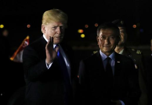 Trump arrives in Singapore for historic summit with North Korea's Kim