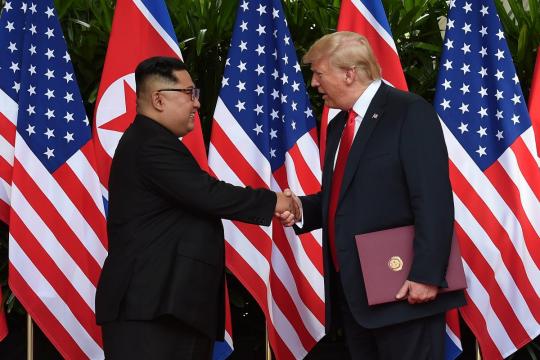 Trump, Kim sign document at end of historic summit