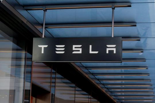 Tesla cuts 9 percent of workforce in search for profit