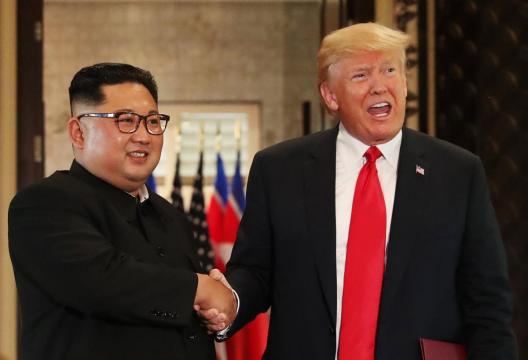 North Korea frames summit as a win as Trump halts war games