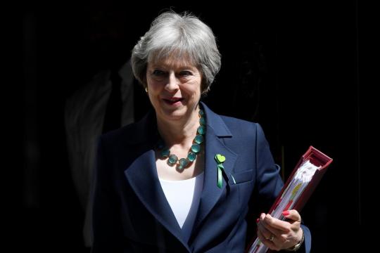 After compromise, May set to avoid defeat in parliament on customs