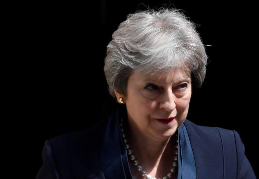 May 'disappointed' after colleague blocks 'upskirting' law