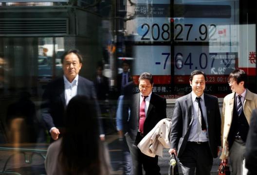Asian shares flirt with nine-month low on mounting trade war fears