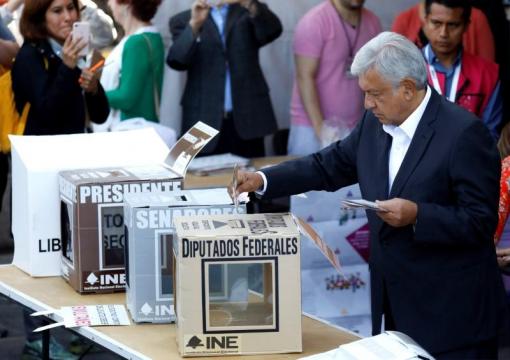 Mexicans vote for president after violent campaign, outsider favored