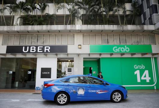 Singapore watchdog says Grab-Uber deal hurts competition, proposes fines