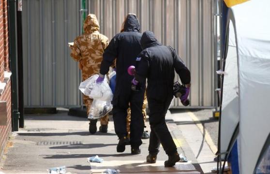 UK police in protective suits seen at site of new Novichok poisoning