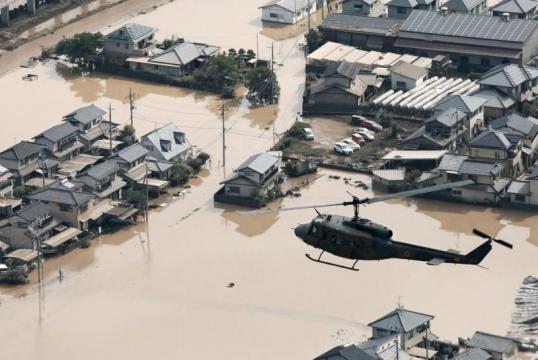 Japan races to find survivors of floods that killed nearly 100