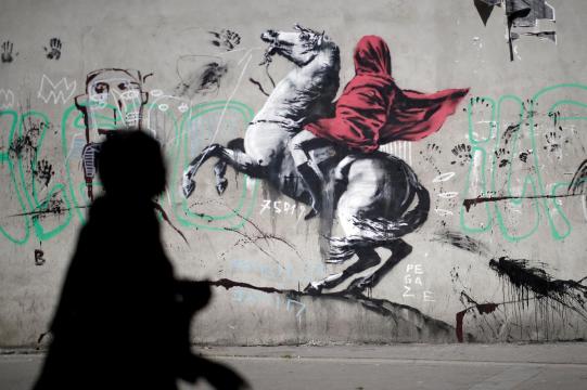 Banksy's subversive art draws tourists and locals in Paris