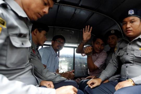 Myanmar court files secrets act charges against Reuters reporters