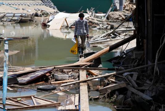 Japan battles shortage of necessities for survivors of worst flood in decades