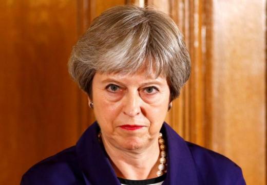 May seeks unity amid chaos over Brexit plans