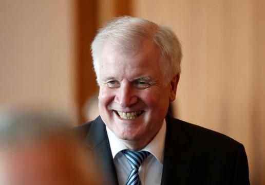 Germany's Seehofer launches migrant plan with 'birthday' jab at deportees